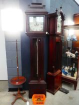 Oak long case clock with eight day birdcage movement