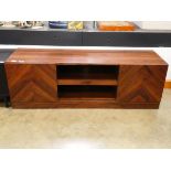 Pine effect entertainment unit with cupboards to side