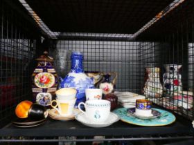 Cage containing cups and saucers, blue and white vase, etched glass celery, jar and Edwardian china