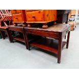 Pair of two tier reproduction mahogany lamp tables