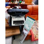 Dunelm curtain track plus a vintage typewriter