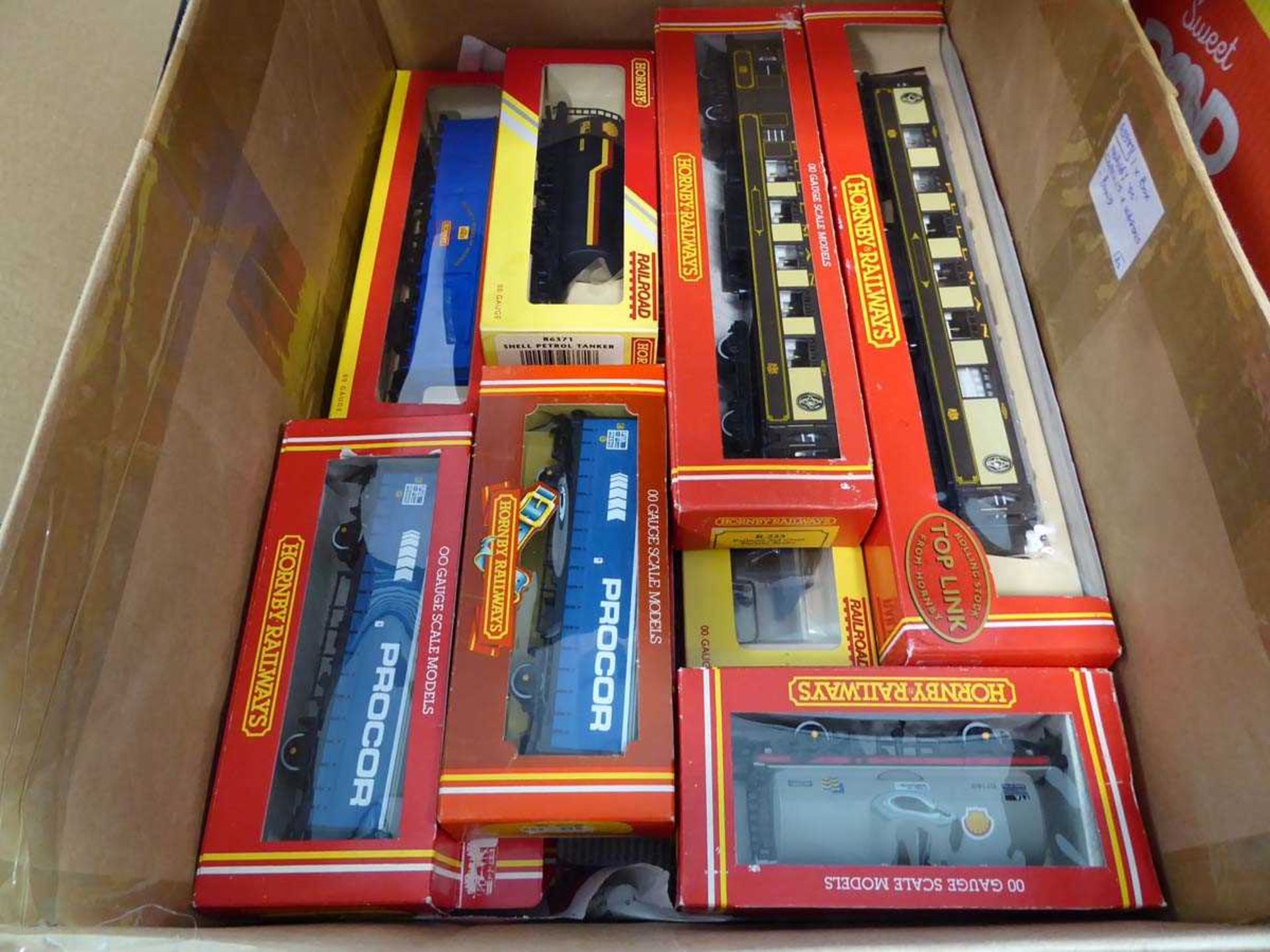 Box of Hornby 00 coaches and wagons, all boxed