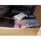 Box containing various colour and black Epson printer cartridges