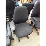 Black cloth swivel armchair