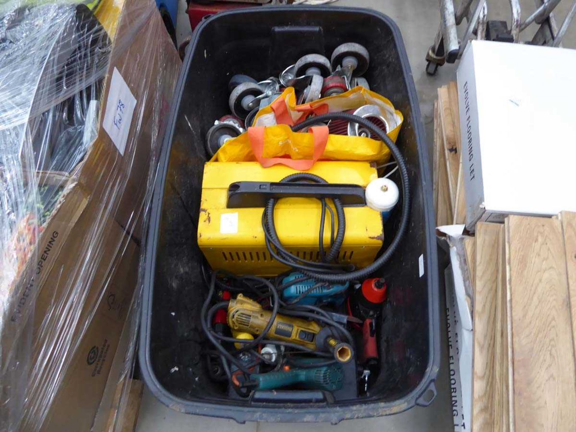 Large box containing power tools, small welder and a quantity of wheels