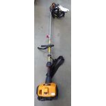 McCulloch petrol powered strimmer with attachments