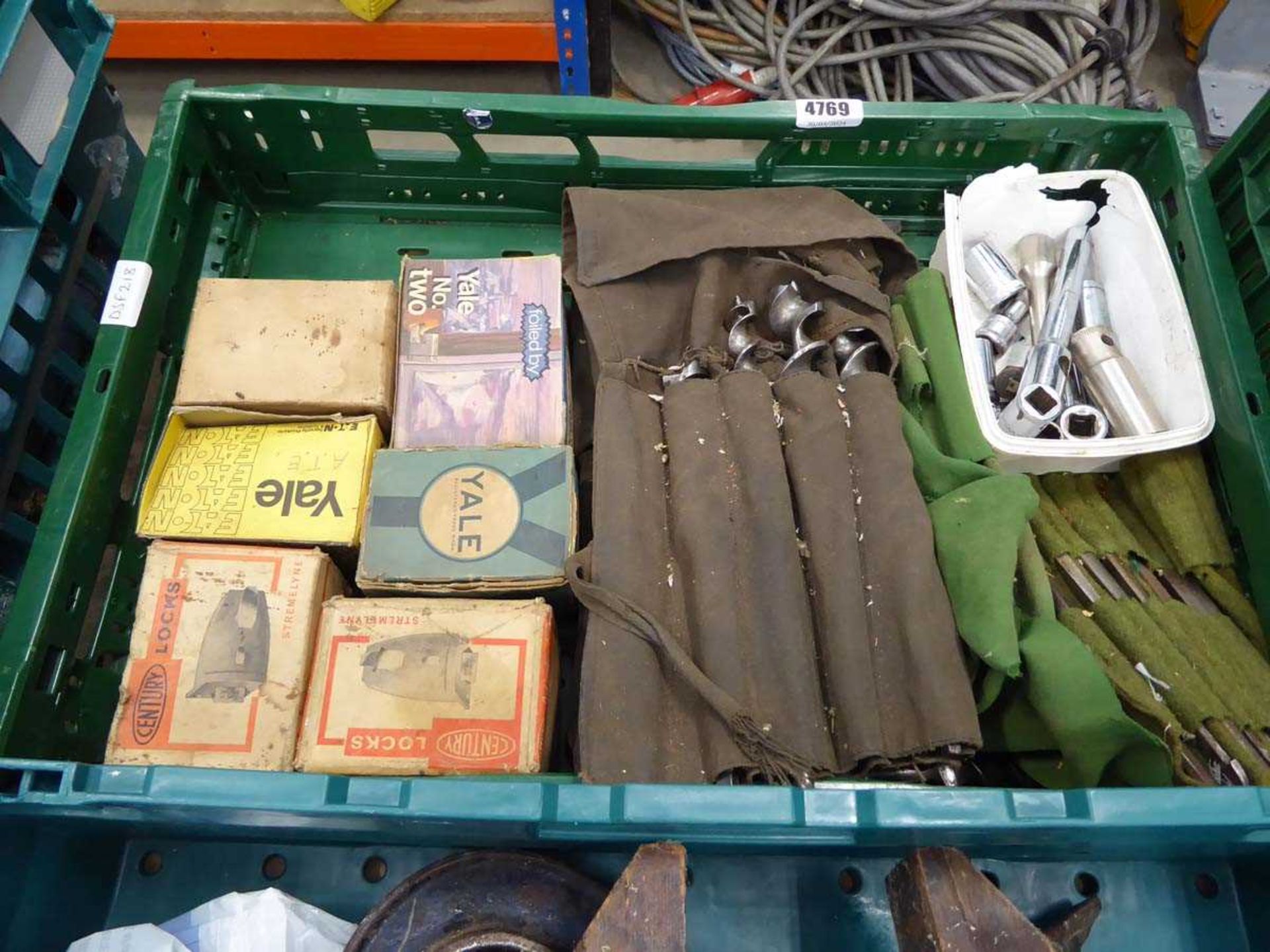 Box containing sockets, drill bits, locks, etc