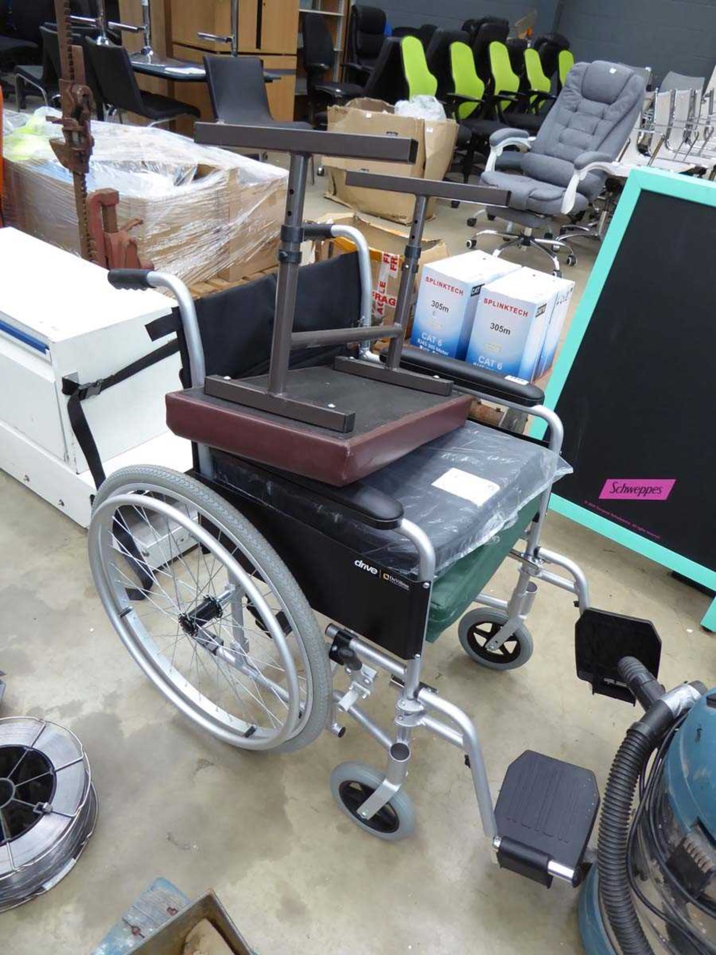 Black wheelchair and stool