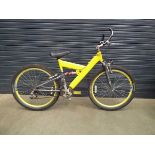Yellow junior suspension mountain bike