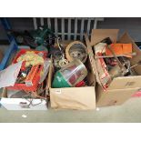 Half an under bay containing assorted items including sanding disks, hoses, record power mask, wheel