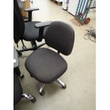 Grey cloth swivel armchair