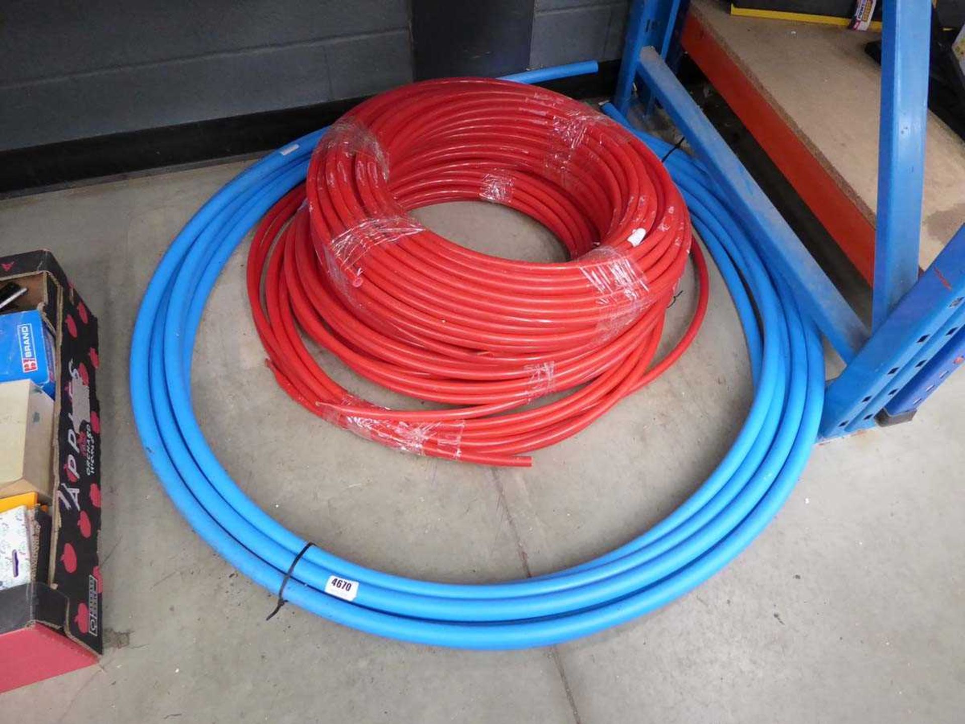 Three lengths of red hose, plus alkathene pipe