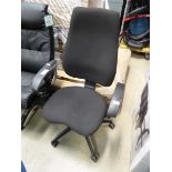 Black cloth swivel armchair