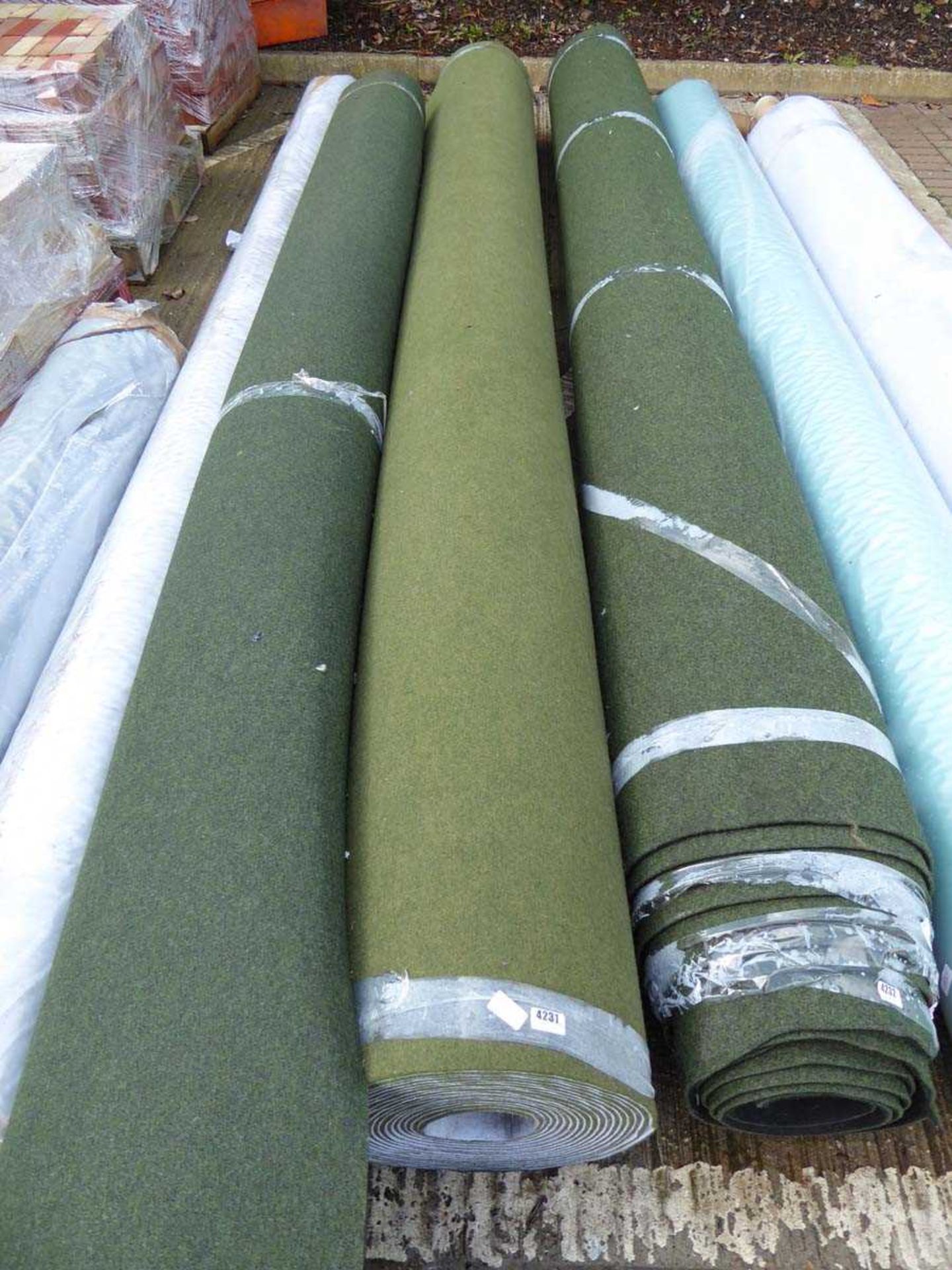 Large roll of light green industrial style carpet