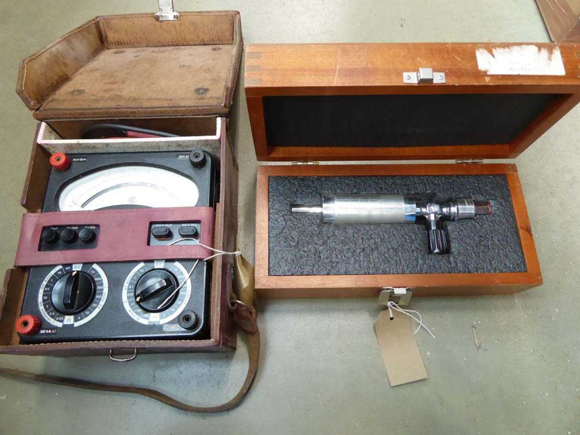 Standard calibrated leak detector and an Avometer