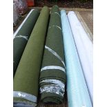 Large roll of dark green industrial style carpet