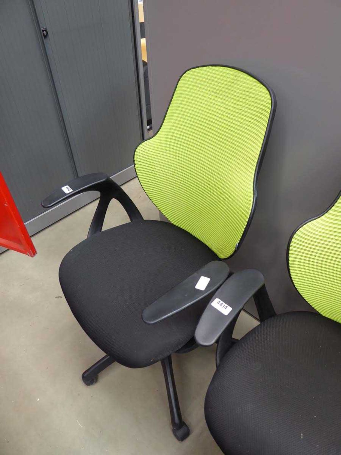 Black cloth lime green mesh back swivel armchair