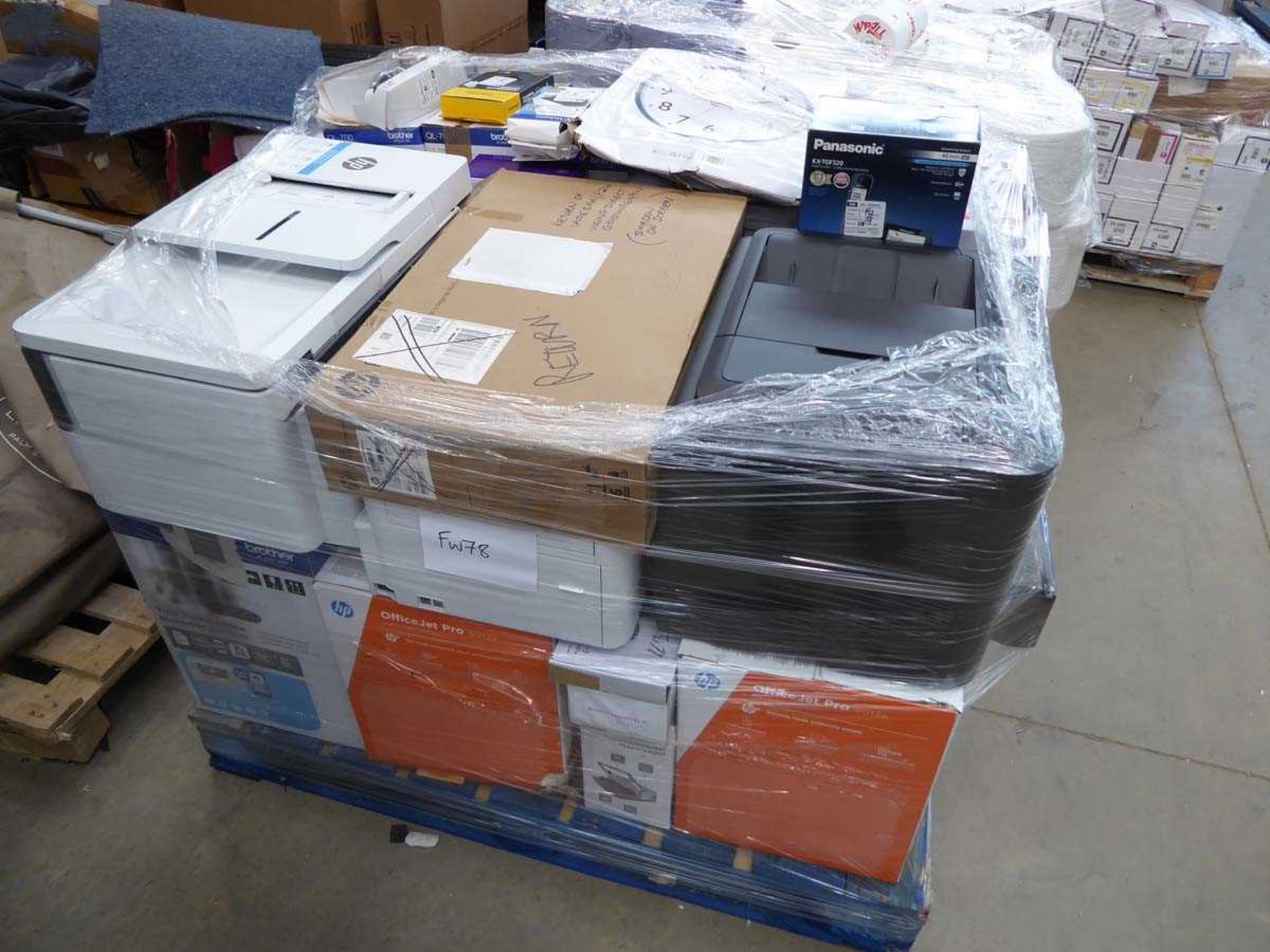 Pallet of office consumables to include keyboards, phones etc