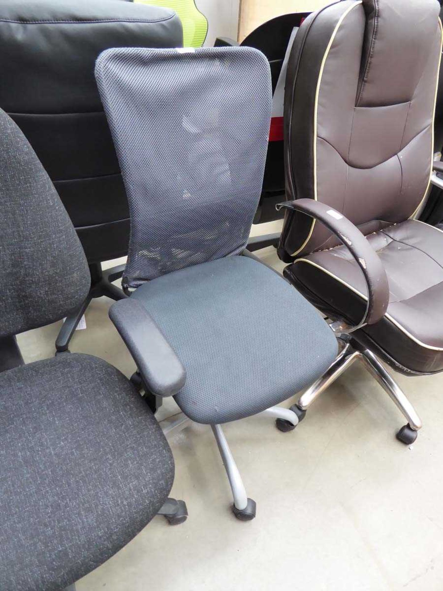 Mesh office operators chair on grey base