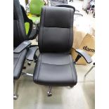 Black high backed swivel armchair