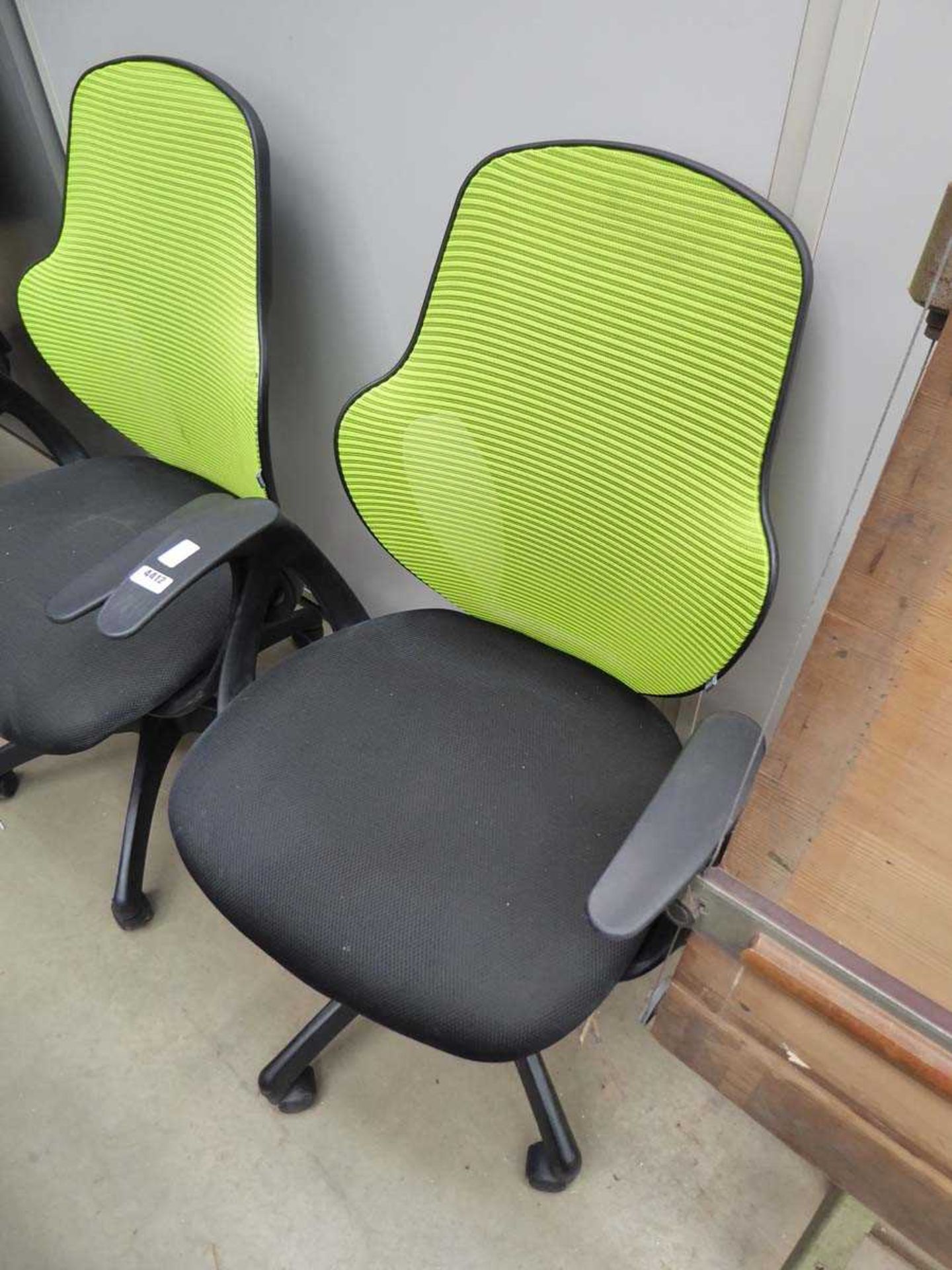 Black cloth lime green mesh back swivel armchair