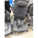 Black cloth mesh back swivel chair with detached arms