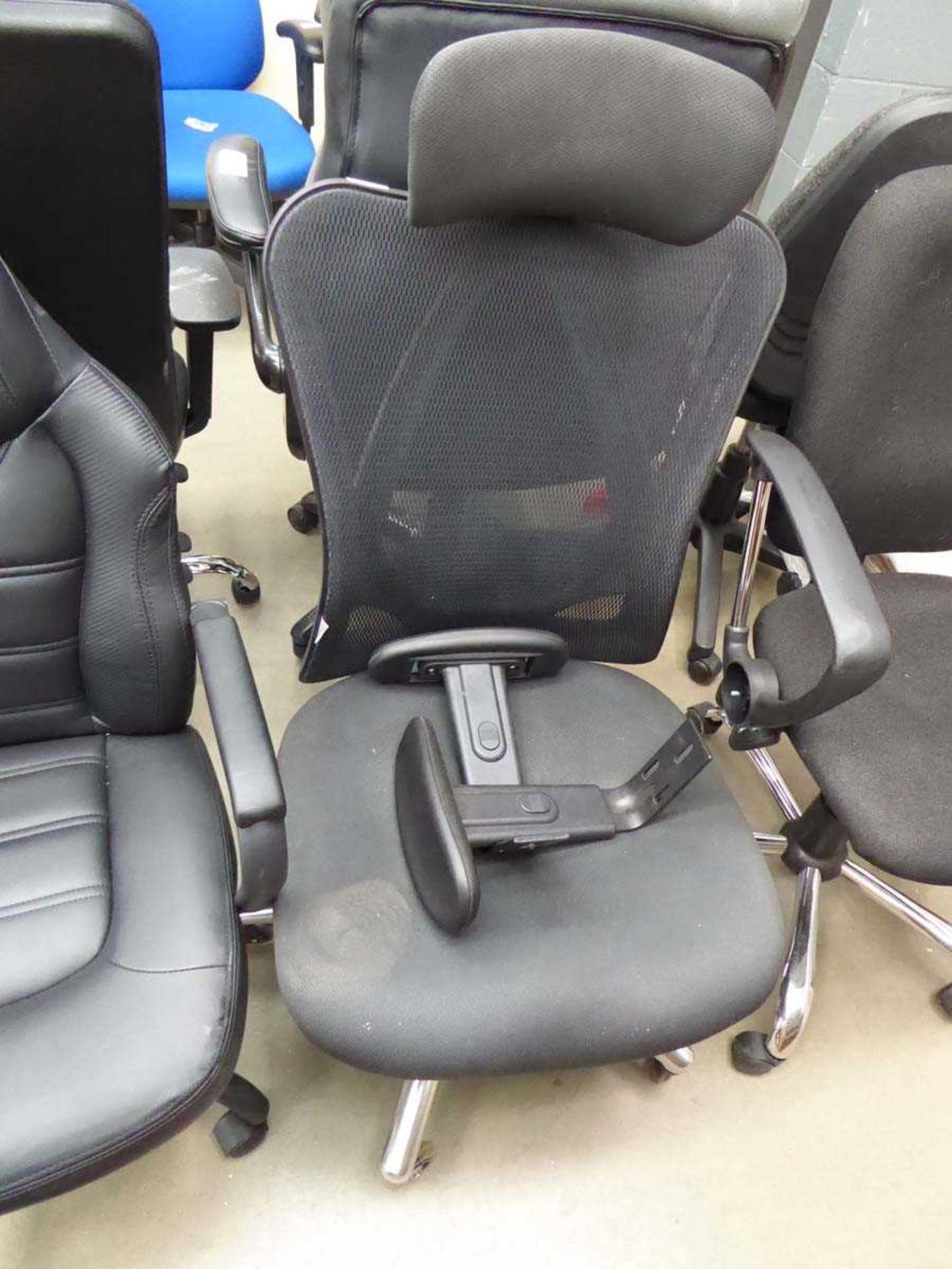 Black cloth mesh back swivel chair with detached arms