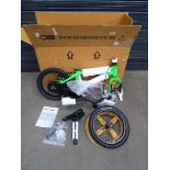 Green flatpack small child's boxed bike