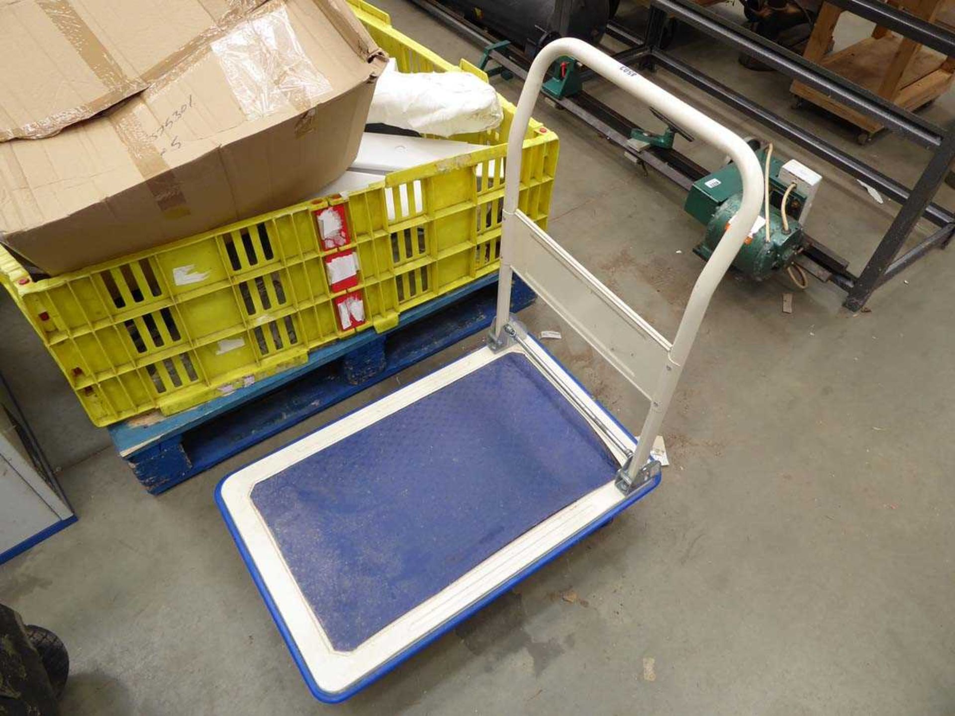 Four wheeled fold up trolley