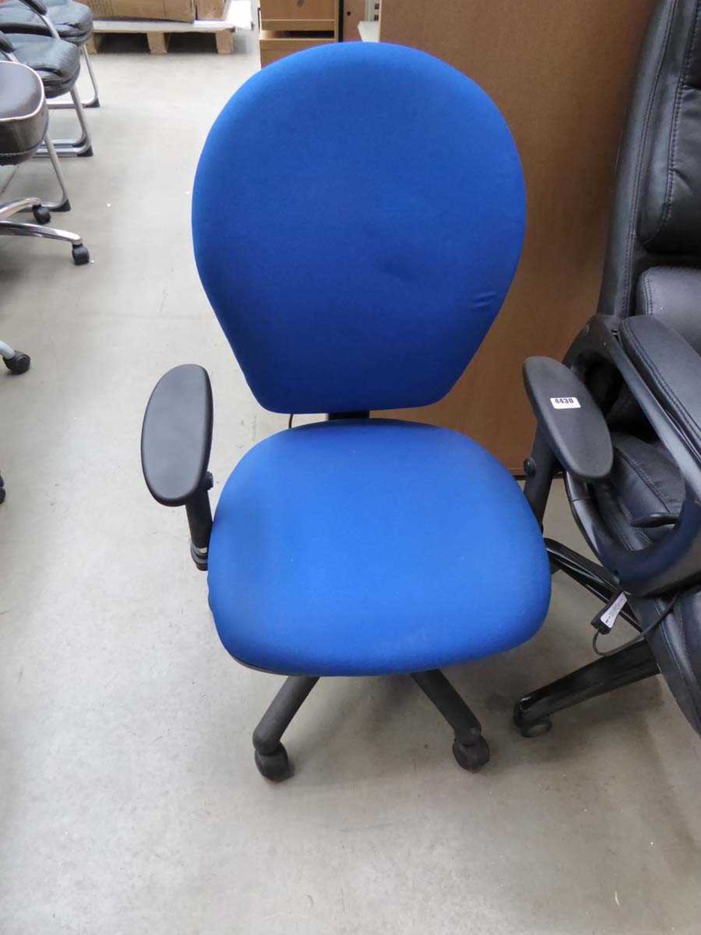 Blue cloth swivel armchair