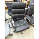 Black high backed swivel armchair