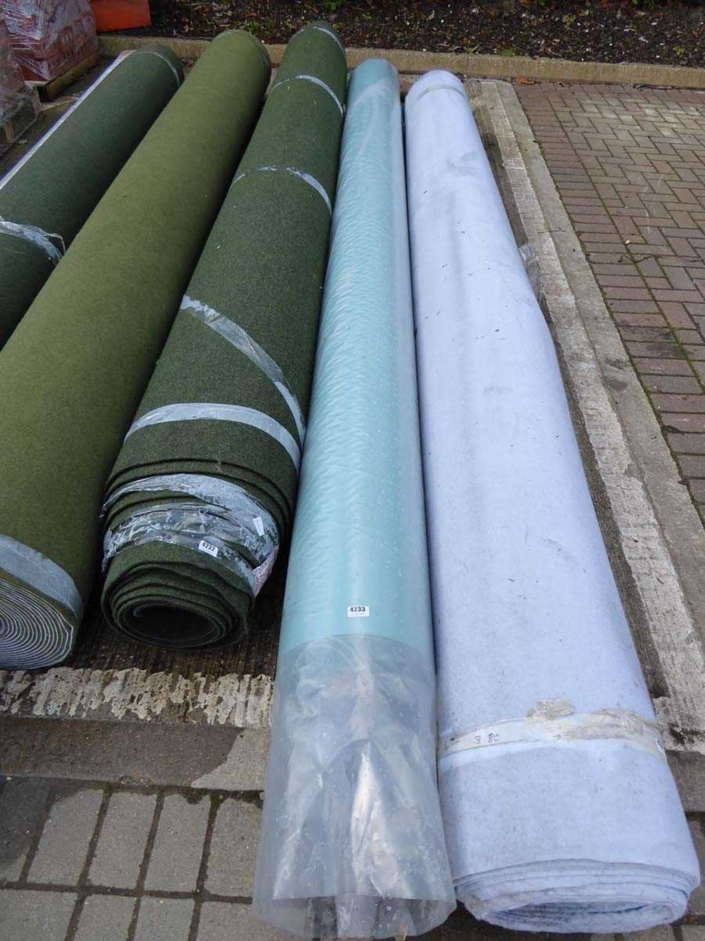 Large roll of industrial style green carpet