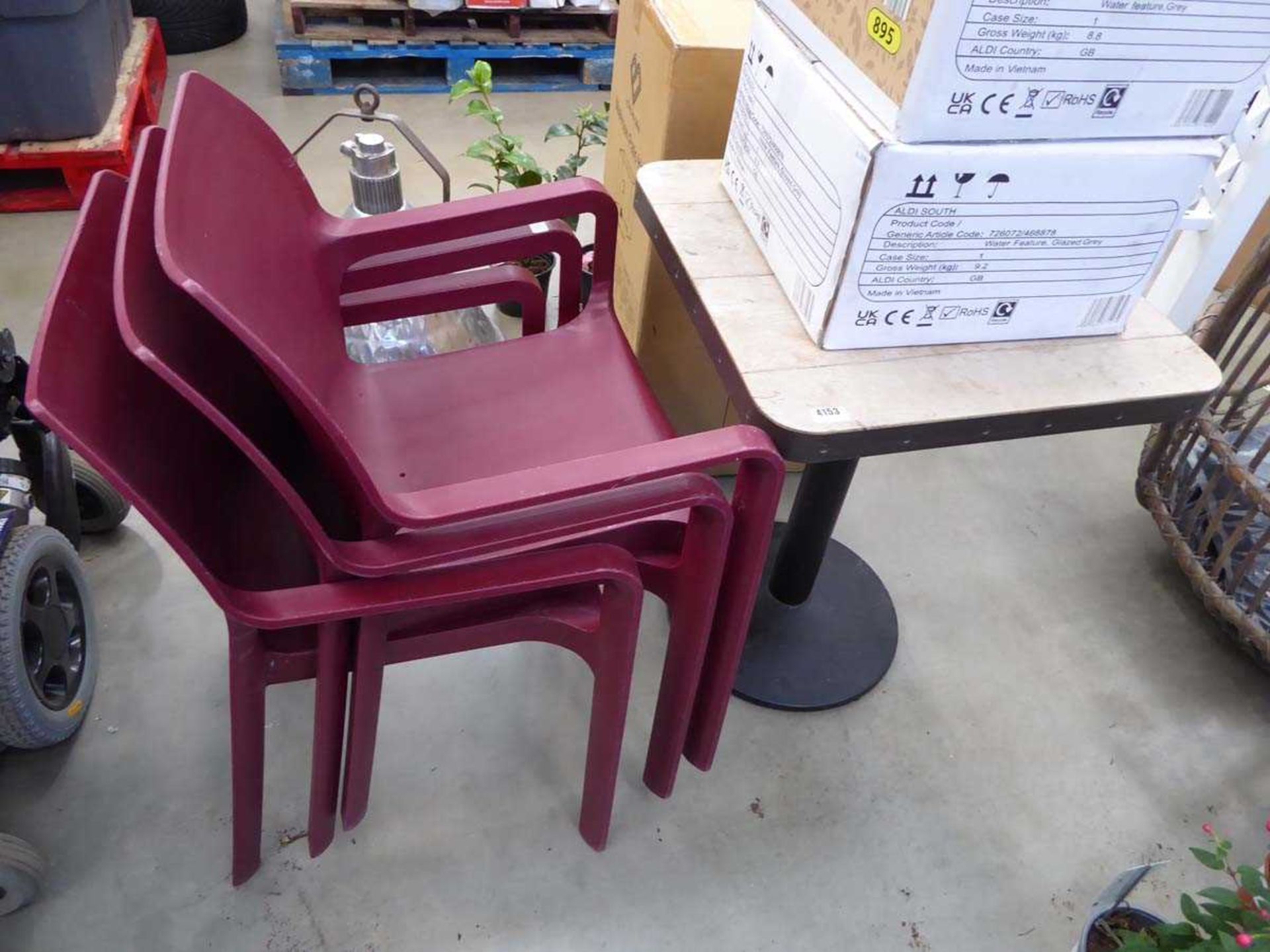 Bistro style table with 3 plastic chairs