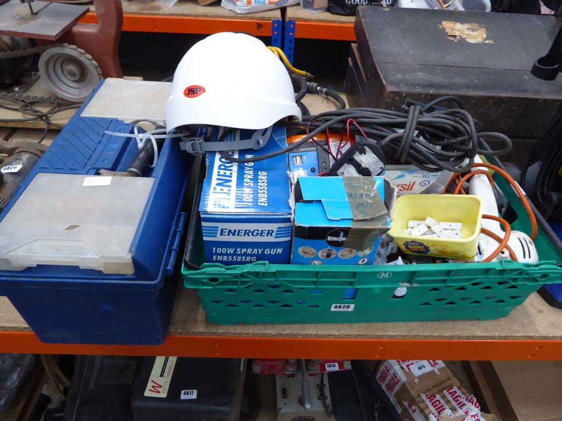 Large plastic crate containing extension cable, drill, spray guns, etc an and empty plastic toolbox