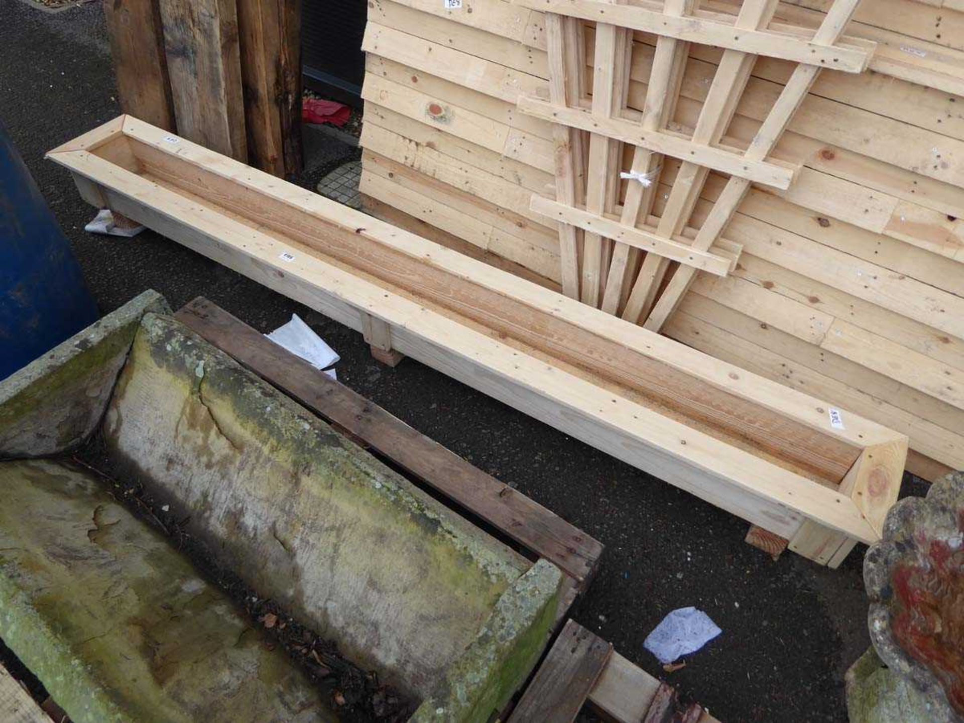 Large wooden planting trough