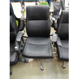 Black high backed swivel armchair