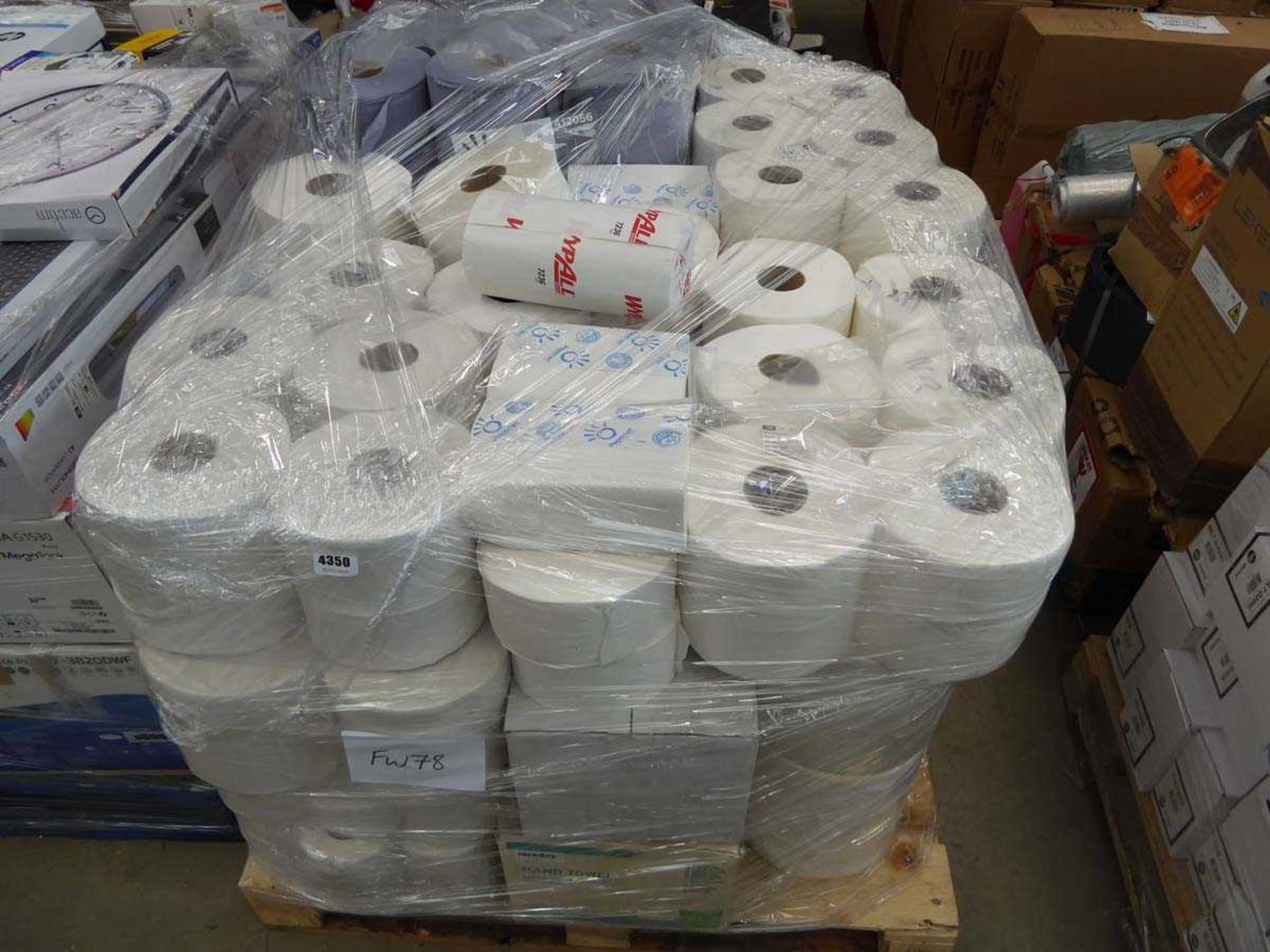 Pallet of paper towels and white and blue roll