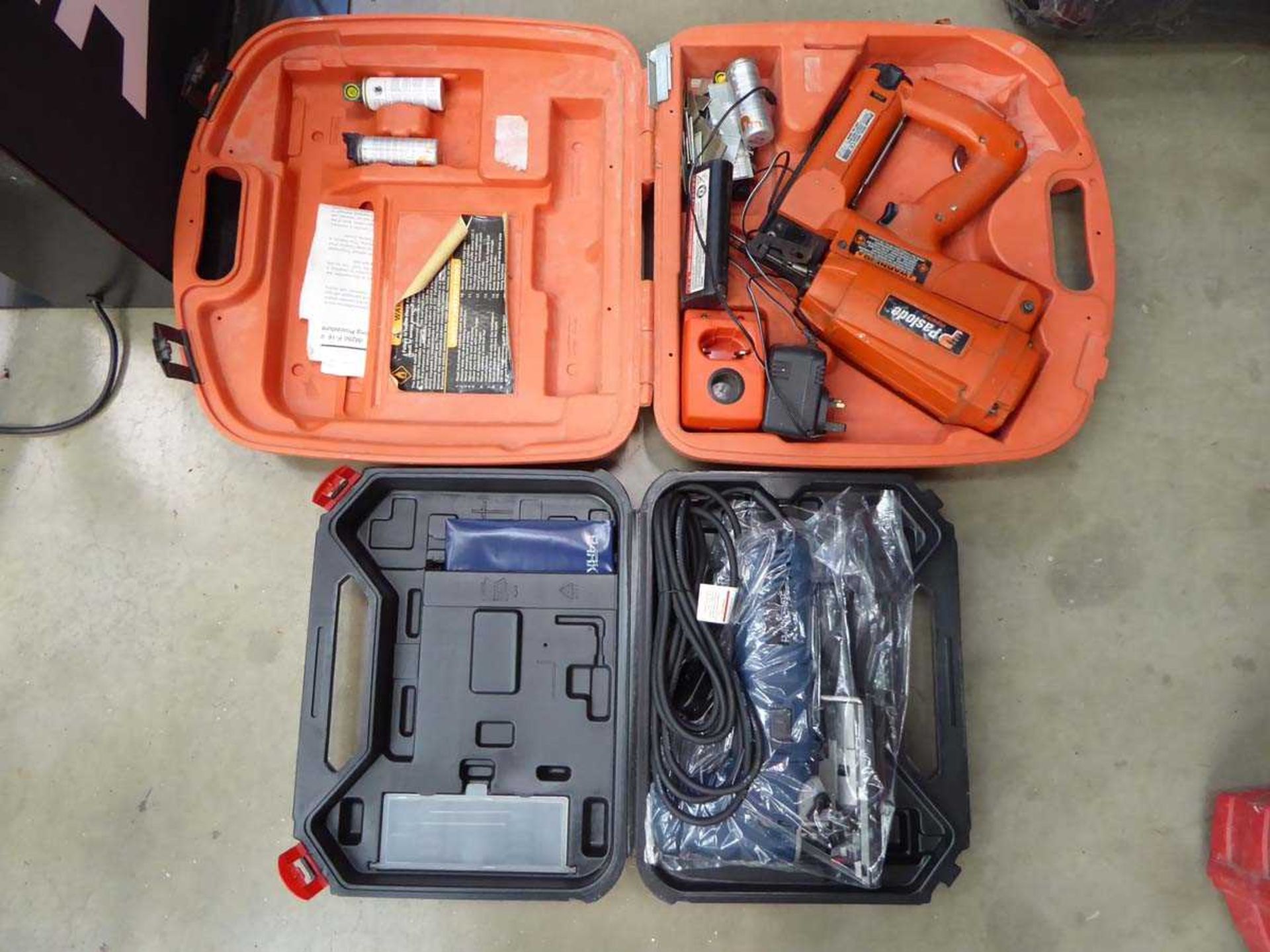 Paslode nail gun with battery and charger and a Parkside jigsaw