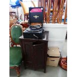 Columbia wind up gramophone plus a record cabinet and a quantity of records