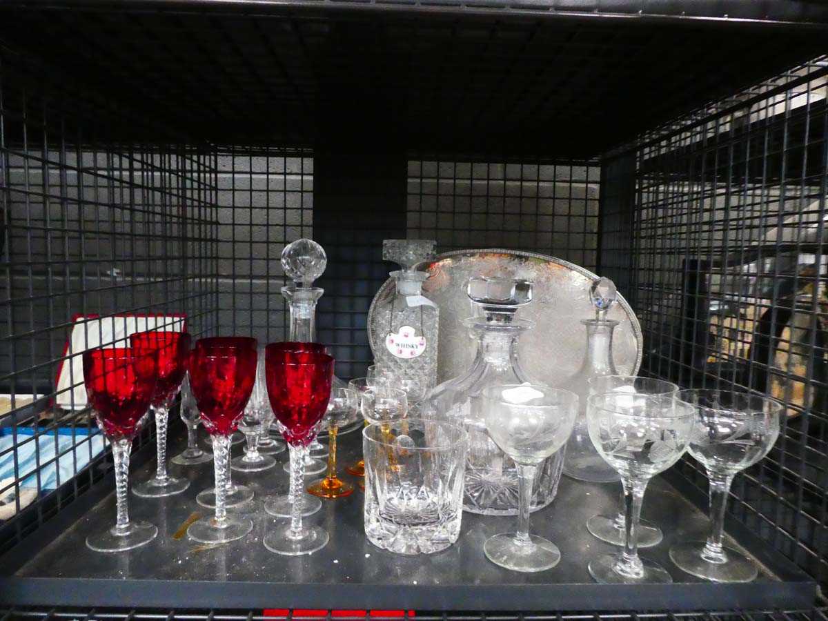 Cage of wine glasses, tumblers, serving tray and decanters