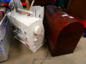 Electric Bernina sewing machine with cased Singer mechanical machine