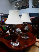 Pair of mirrored urn shaped table lamps with pleated shades