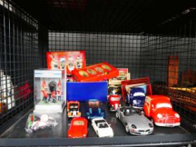 Cage of loose and boxed die cast vehicles plus other toys