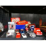 Cage of loose and boxed die cast vehicles plus other toys