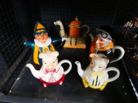 Cage of 5 Novelty teapots
