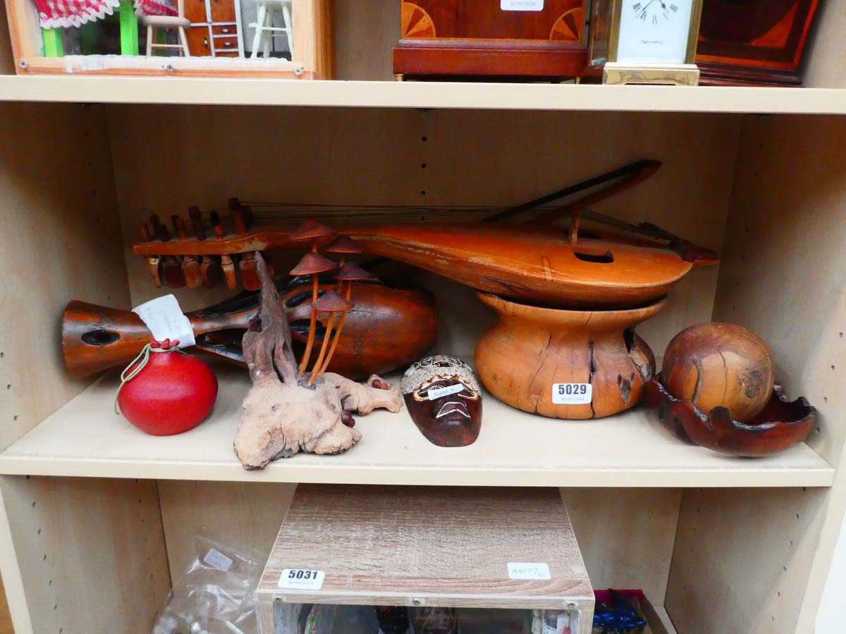 Quantity of treen to include bowls, vases, pomegranate and mushroom ornaments, mask plus a mandolin