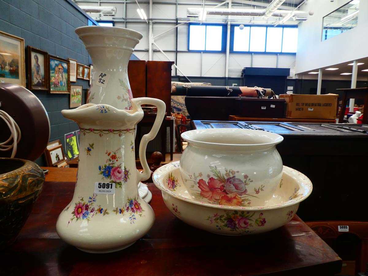 Floral patterned jardinière plus a jug and bowl