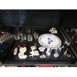 Cage containing ornamental posies, sherry glasses, glass animal figures and French revolution