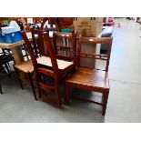 Three elm seated dining chairs plus a chair with strung seat