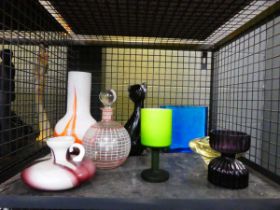 Cage containing decanter, cat figure, bowls and vases